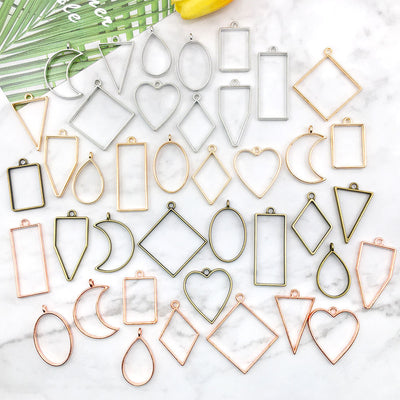 Metallic heart charms arranged on a light background