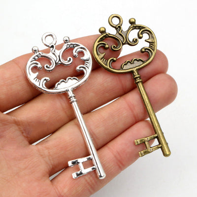 large ornate skeleton key charms assortment showing the available designs and finishes