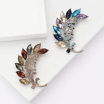 Marquise Crystal Leaf Brooch With Polished Metal And Sculpted Decorative Details