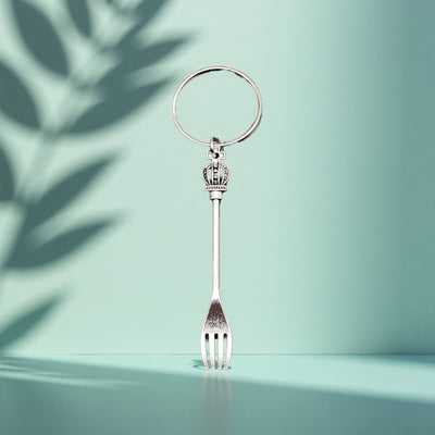 Main display of silver tone crown handle fork keychain