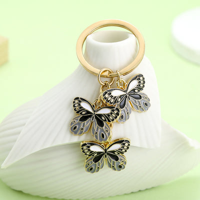 Image 1 showing butterfly keychains shown in the product image.