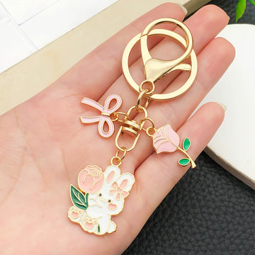 Twelve Pink Bow Rose and Rabbit Metal Keychain Designs