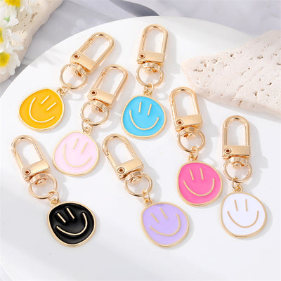 Main product view of gold Tone Colorful Enamel Smiley Face Clip Keychains