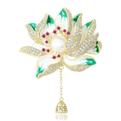 Front view of green lotus brooch pendant with chain against a white background.