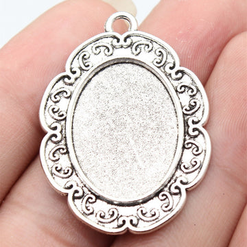 Scrollwork Oval 18 x 25 mm Pendant Setting in Silver Tone