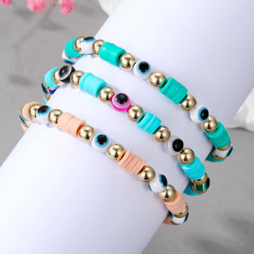Gold Tone Evil Eye Stretch Bracelets with Colorful Disc Beads