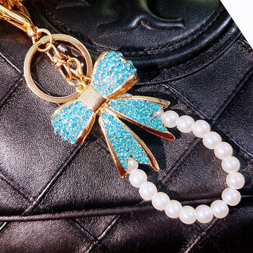 Full Crystal Bow Keychains with Plain Pearl Strand and Fortune Loop Options