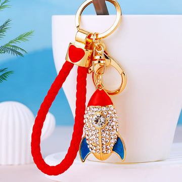 Jeweled Red Rocket Keychain with Blue Fins and Braided Wrist Loop