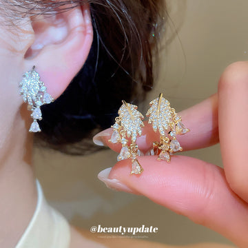 Crystal Leaf Cluster Dangle Clip On Earrings With Polished Metal Details