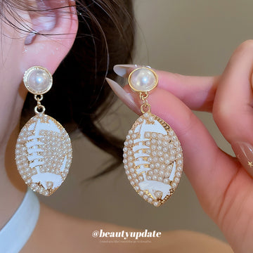 White Oval Leaf and Pearl Drop Earrings in Gold Tone