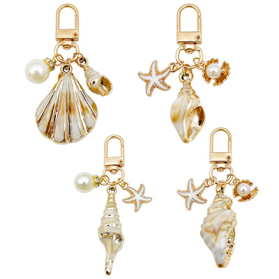 Image 5 showing starfish, conch and shell keychains shown in the product image.