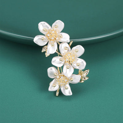 Crystal Branch Flower Brooch with Pearl Centers displayed from the front