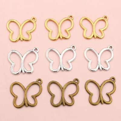 Openwork Butterfly Charms arranged in the pictured color and finish options