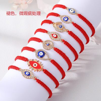 Main product view of gold Tone Crystal Evil Eye Adjustable Red Cord Bracelets in Eight Designs