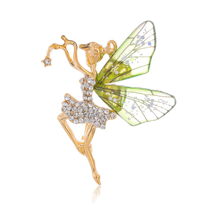 Front product view of the angel wing brooch pin in gold and silver