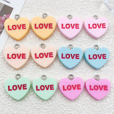 Printed detail graphic for the letter and heart charms