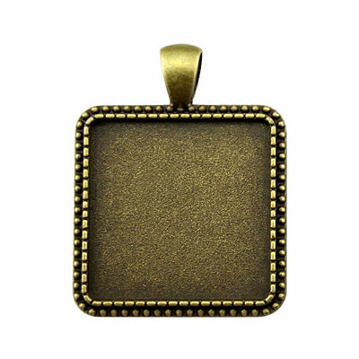 Silver Tone Square Beaded Cabochon Pendant Tray Setting shown in image 1 with a square tray with a dotted rim