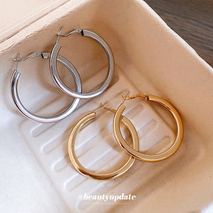 Silver Tone Chunky Round Hoop Earrings With Decorative Metal Accents