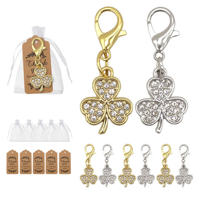 Gold and silver rhinestone clover charms with bags and tags