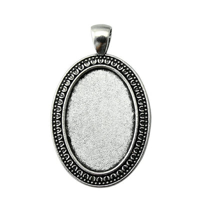 Beaded oval pendant setting front view on a white background