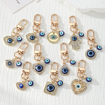 Gold Tone Blue Evil Eye Clip Charms in Eleven Designs