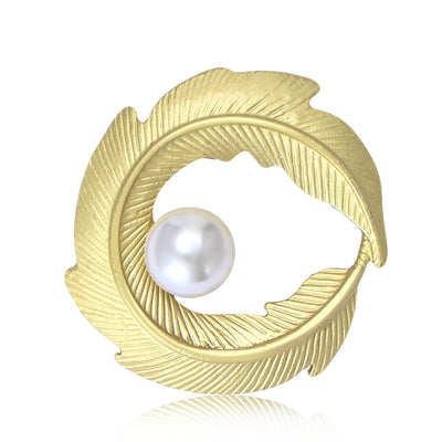 Matte gold curved leaf circle brooch with white pearl center