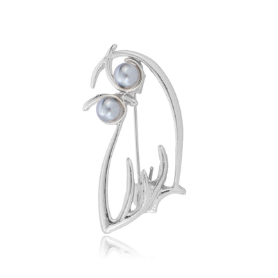 Front product view of the ring with two pearls