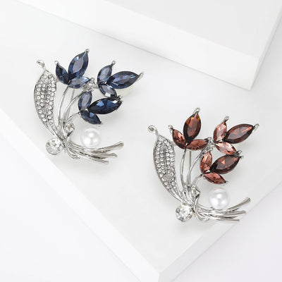 Crystal Floral Sprig Brooch shown against a white display background