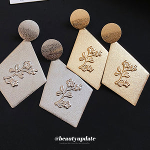 Textured Diamond Drop Earrings with Raised Floral Motifs