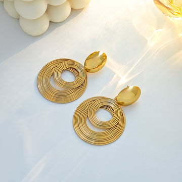 Gold Tone Concentric Coil Ring Statement Dangle Earrings