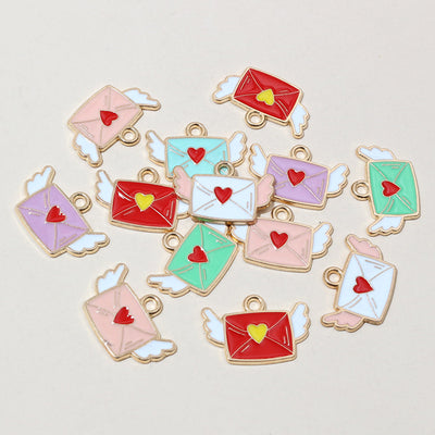 enamel love letter charms assortment showing the available designs and finishes