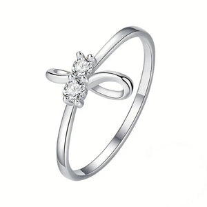 Silver Tone Bow Ring With Clear Floral Stone Center