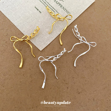 Bow Outline Drop Hook Earrings In Gold And Silver With Decorative Metal Details
