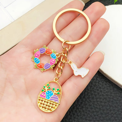 Overview showing the available color and design variations of the colorful easter basket rabbit and egg metal keychain