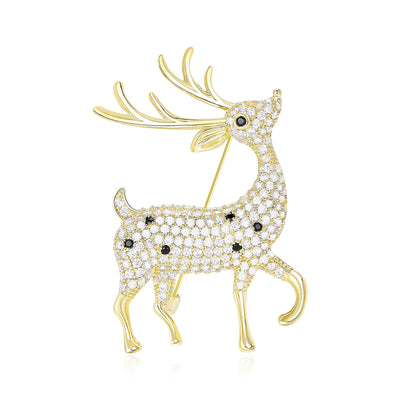 Front product view of the prancing gold-tone reindeer covered in clear crystals with black spots brooch
