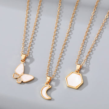 Gold Tone White Shell Butterfly Moon and Hexagon Pendant Necklaces