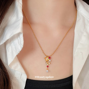 Gold Tone Floral Crystal and Faux Pearl Pendant Necklace