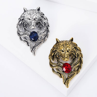 Product image 1 showing the openwork tiger head brooch with large red or blue crystal.