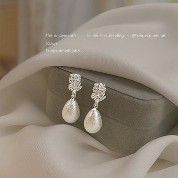 Silver Tone Clear Stone Top And Irregular White Pearl Stud Earrings
