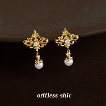 Gold Tone Openwork Iris And White Pearl Drop Stud Earrings