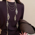 Light Luxury Alloy Leaf Layered Tassel Sweater Necklace With Minimalist Fashion Design view 1