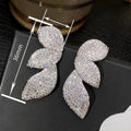 Luxury Marquise Leaf Stud Earrings For Women With Micro Pave Sparkling Irregular Leaf Design view 4
