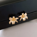 Light Luxury Smooth Metal Flower Stud Earrings With Silver Pin Vintage European Style view 1