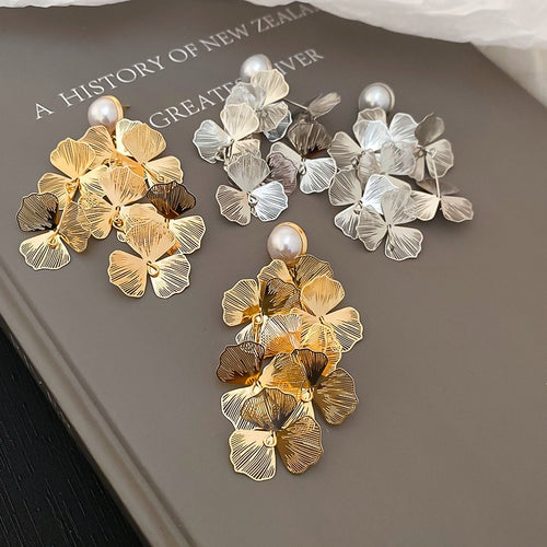 Light Luxury Metal Hollow Flower Tassel Drop Earrings With Silver Needle For Women
