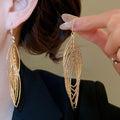 Iron Metal Zircon Oval Hollow Geometric Hook Earrings For Women Minimalist Light Luxury Style view 4