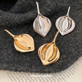 Metal Smooth Leaf Drop Earrings With Silver Needle Geometric Diamond Statement Design view 1