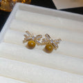 Gold Plated Silver Needle Zircon Tiger Eye Bow Stud Earrings Vintage Light Luxury Faux Pearl Jewelry view 3