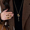 Light Luxury Faux Pearl Tiger Eye Zircon Pony Pendant Sweater Necklace For Women view 2