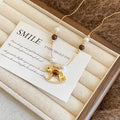Light Luxury Faux Pearl Tiger Eye Zircon Pony Pendant Sweater Necklace For Women view 3