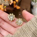 Light Luxury Alloy Gold Plated Rhinestone Flower Petal Clip-on Earrings For Women view 3